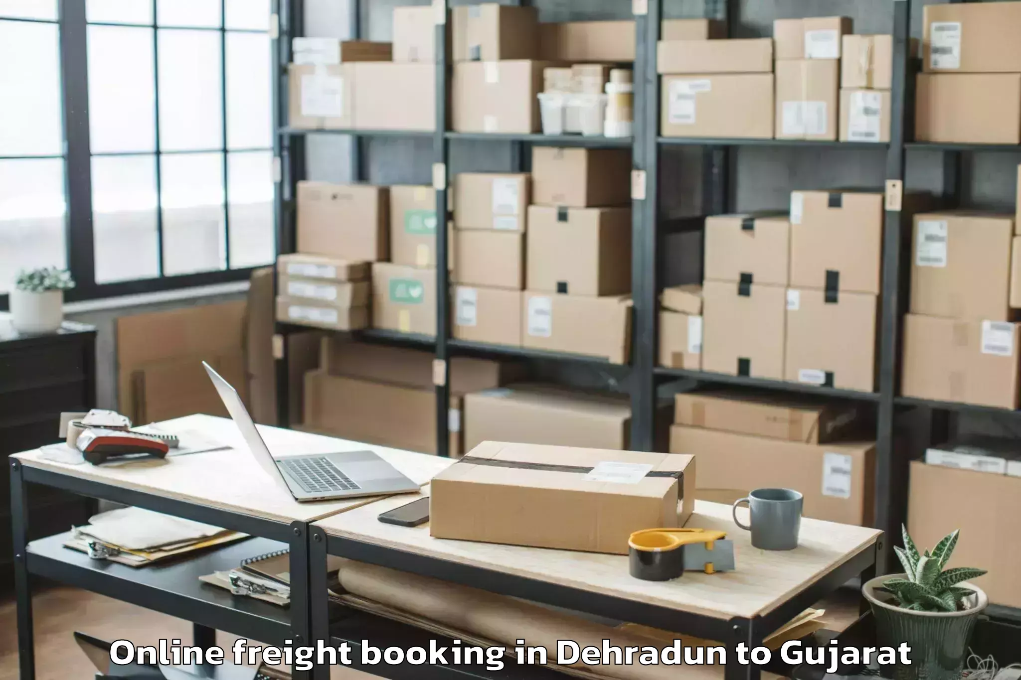 Book Dehradun to Malpur Online Freight Booking